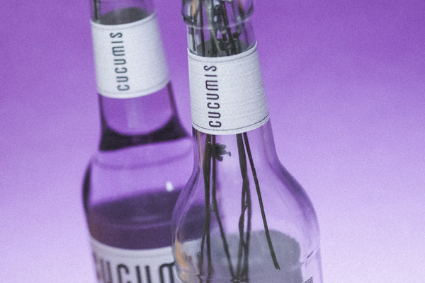 white and black labeled bottle