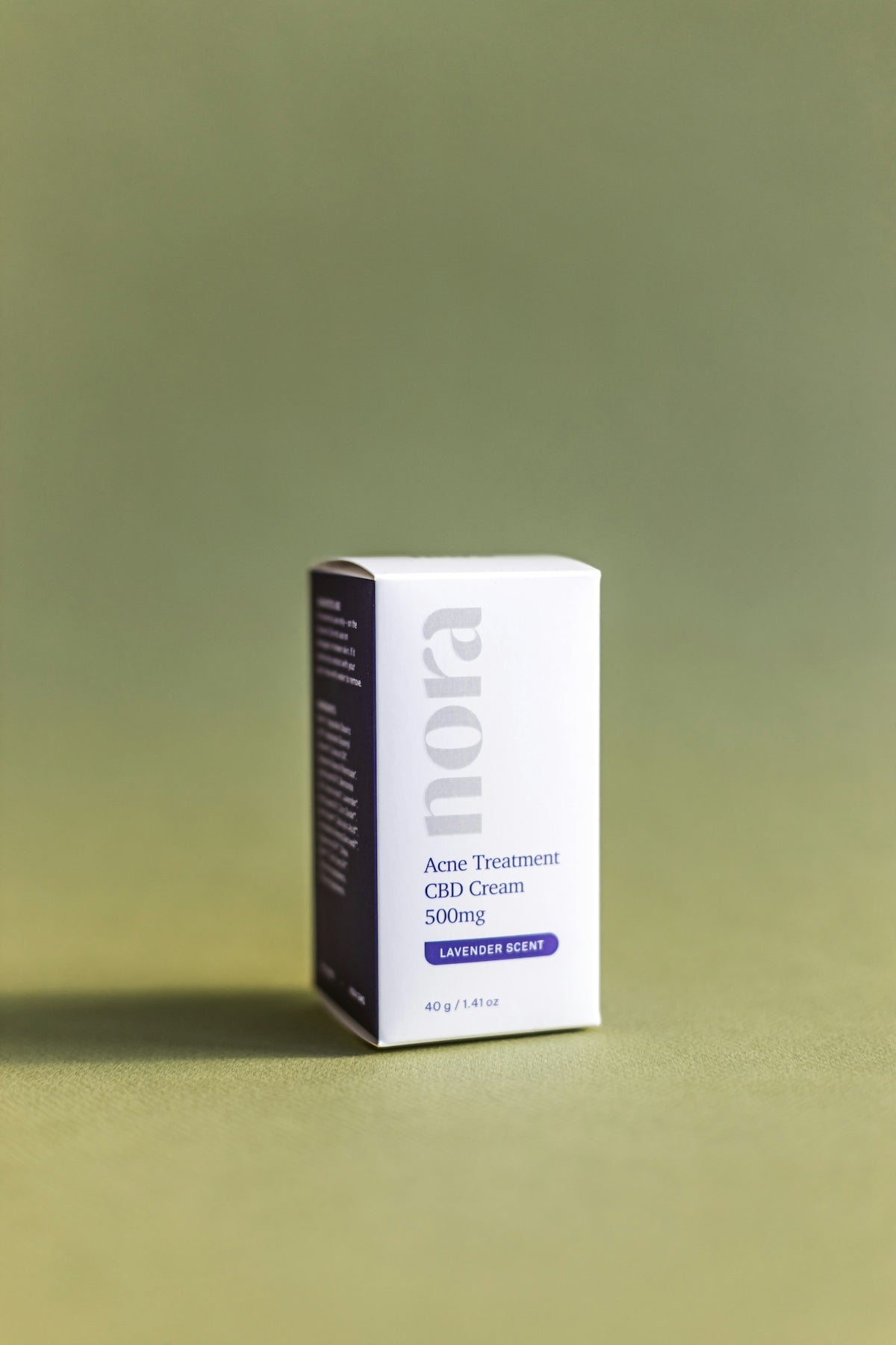 a small white box sitting on top of a table