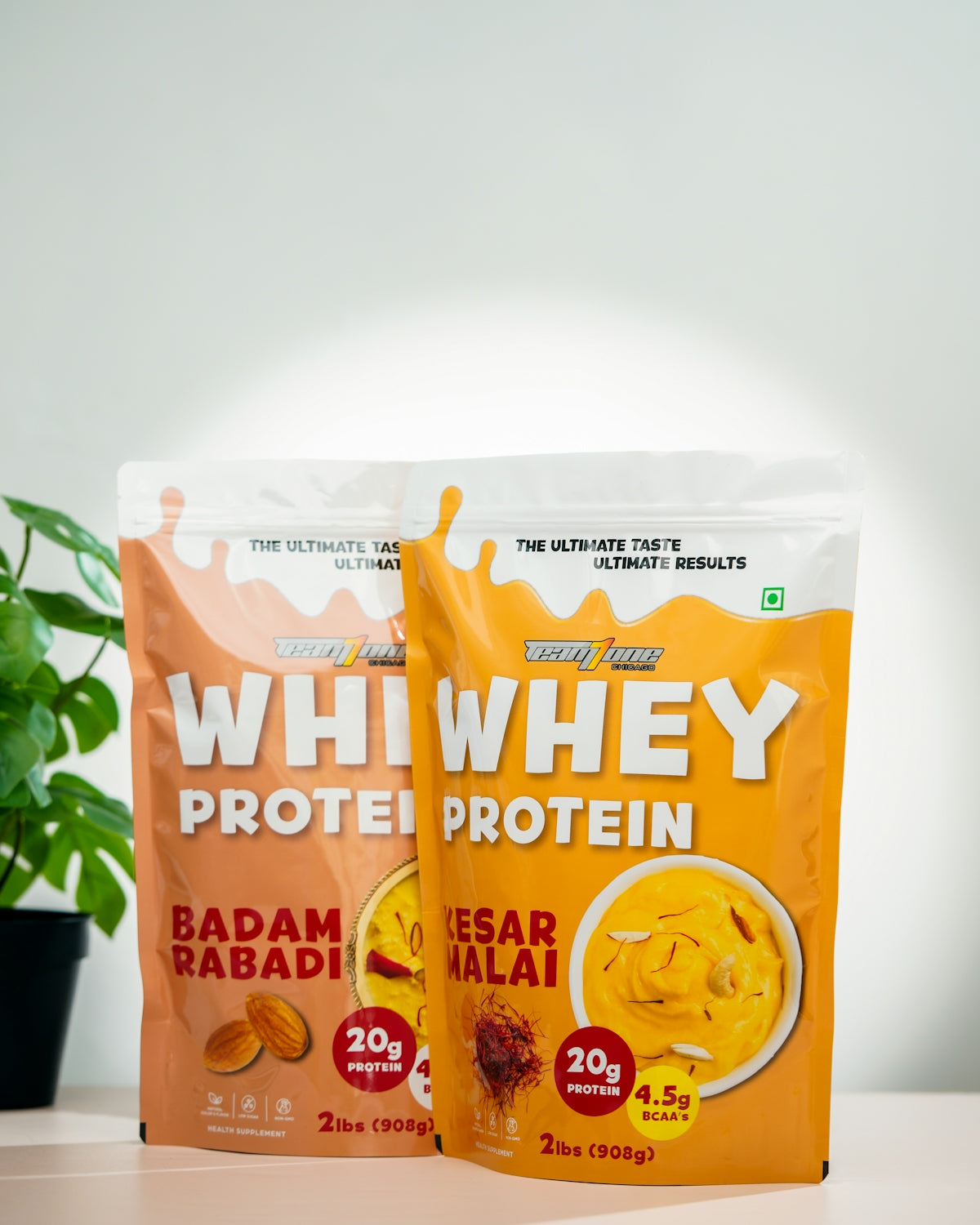 a couple of bags of protein sitting on top of a table